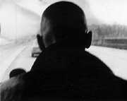 Photo showing the back of Les Chappell's head, in silhouette